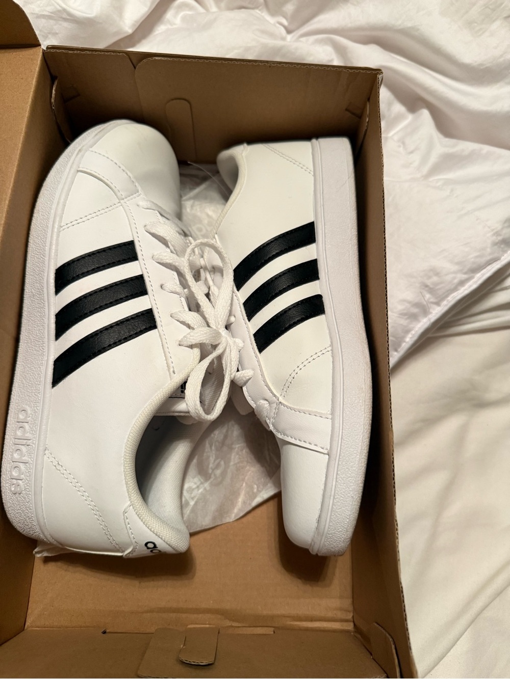 Adidas Kid’s White Sneakers with Black Stripes